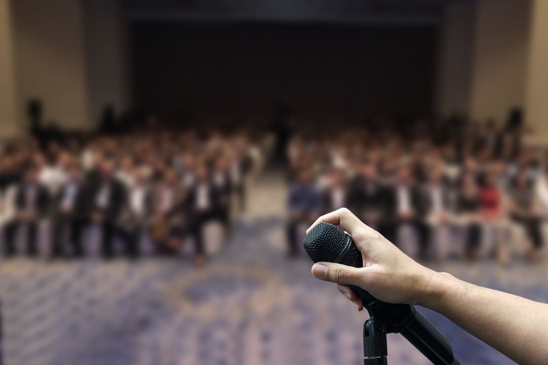 Oscar Romano addressing a professional audience
